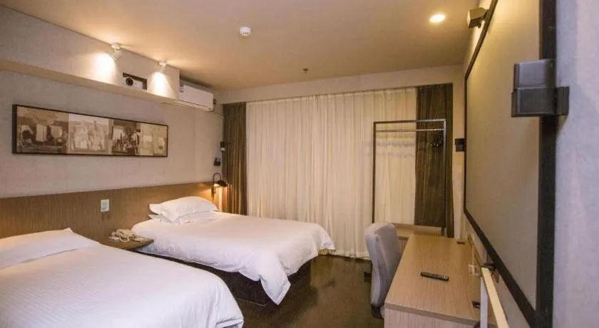 Bed in Jinjiang Inn Select Shenyang Tawan Xingshun Night Market Metro Station
