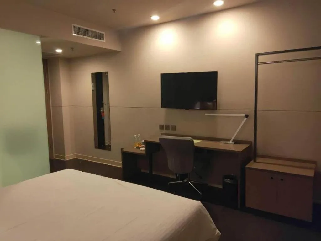 Bed in Jinjiang Inn Select Shenyang Tawan Xingshun Night Market Metro Station