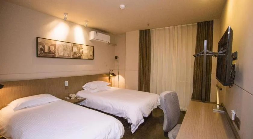 Bed in Jinjiang Inn Select Shenyang Tawan Xingshun Night Market Metro Station