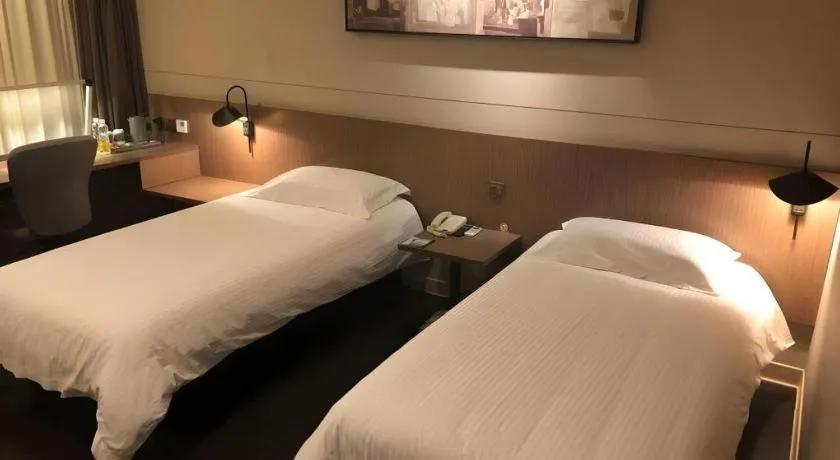 Bed in Jinjiang Inn Select Shenyang Tawan Xingshun Night Market Metro Station
