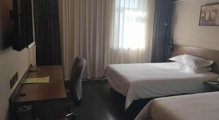 Bed in Jinjiang Inn Select Shenyang Tawan Xingshun Night Market Metro Station