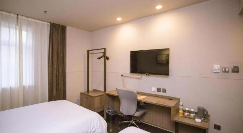 Bed in Jinjiang Inn Select Shenyang Tawan Xingshun Night Market Metro Station