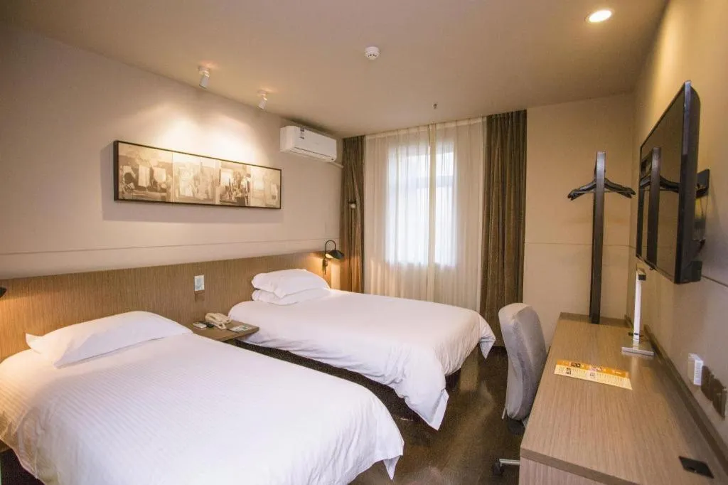 Bed in Jinjiang Inn Select Shenyang Tawan Xingshun Night Market Metro Station