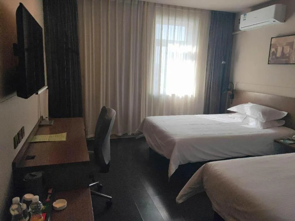 Bed in Jinjiang Inn Select Shenyang Tawan Xingshun Night Market Metro Station