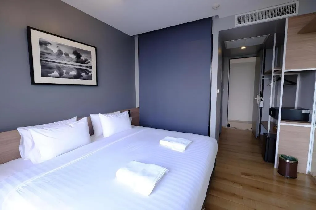 Bed in R Photo Hotel