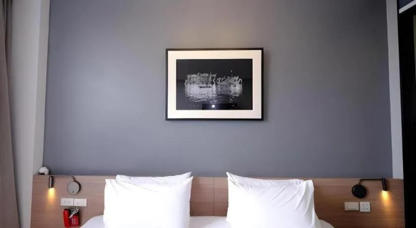 Bed in R Photo Hotel