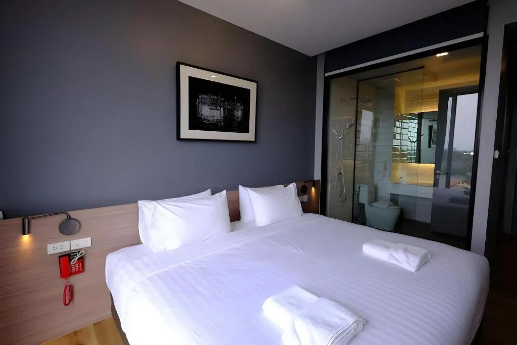 Bed in R Photo Hotel