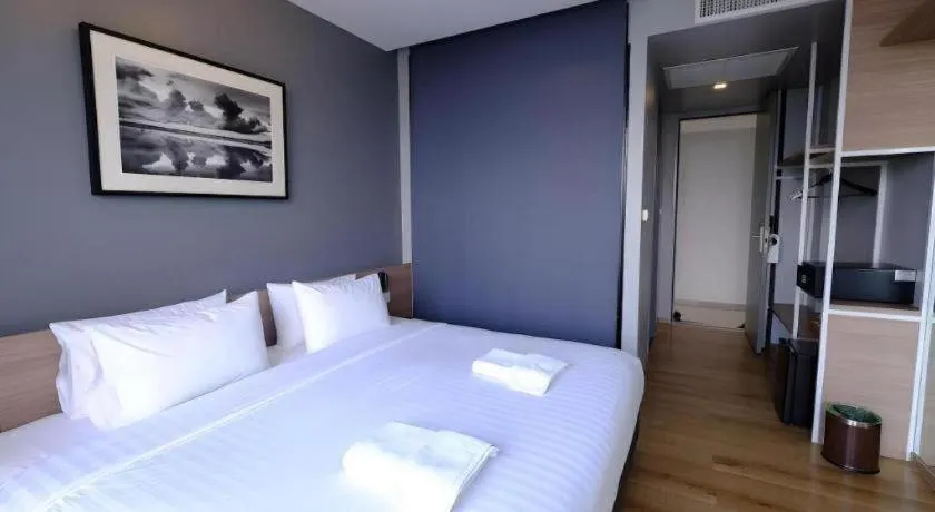 Bed in R Photo Hotel