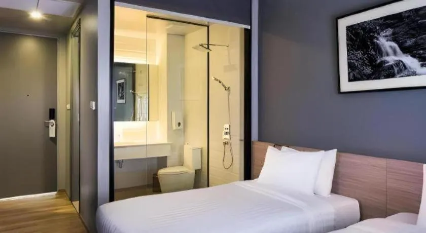 Bed in R Photo Hotel