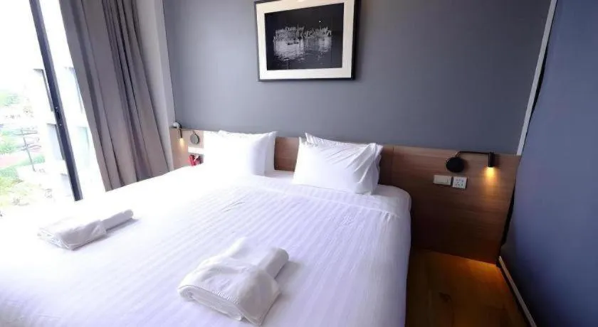 Bed in R Photo Hotel