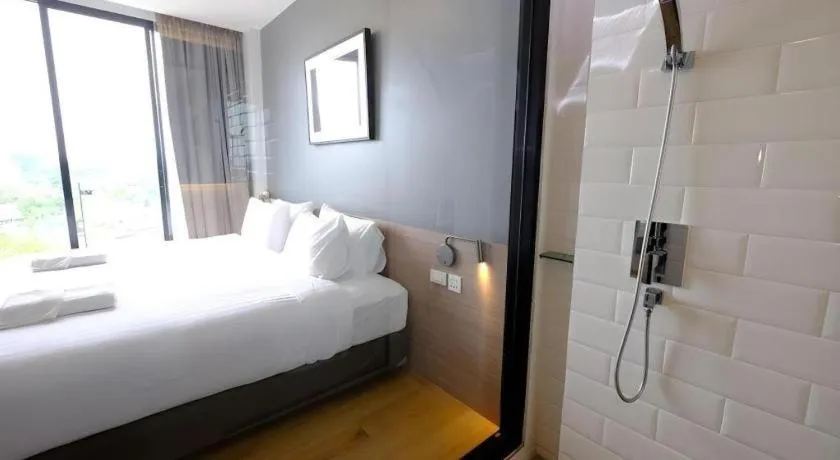 Bed in R Photo Hotel