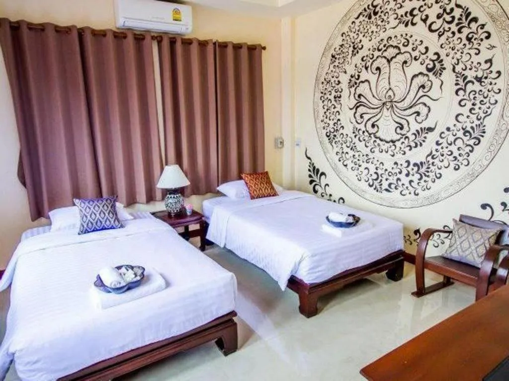 Bed in Wake Up at Muang Kao Boutique Hotel