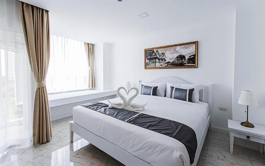 Bed in B2 Hua Hin Premier Hotel