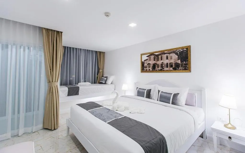 Bed in B2 Hua Hin Premier Hotel