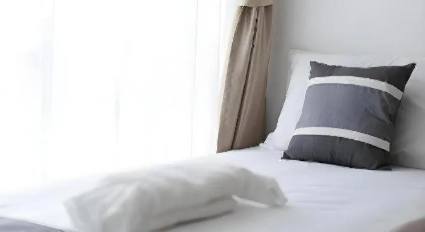 Bed in B2 Hua Hin Premier Hotel