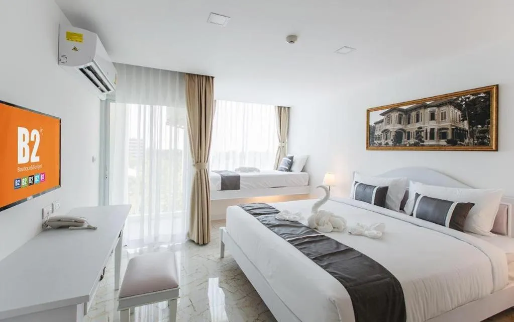 Bed in B2 Hua Hin Premier Hotel