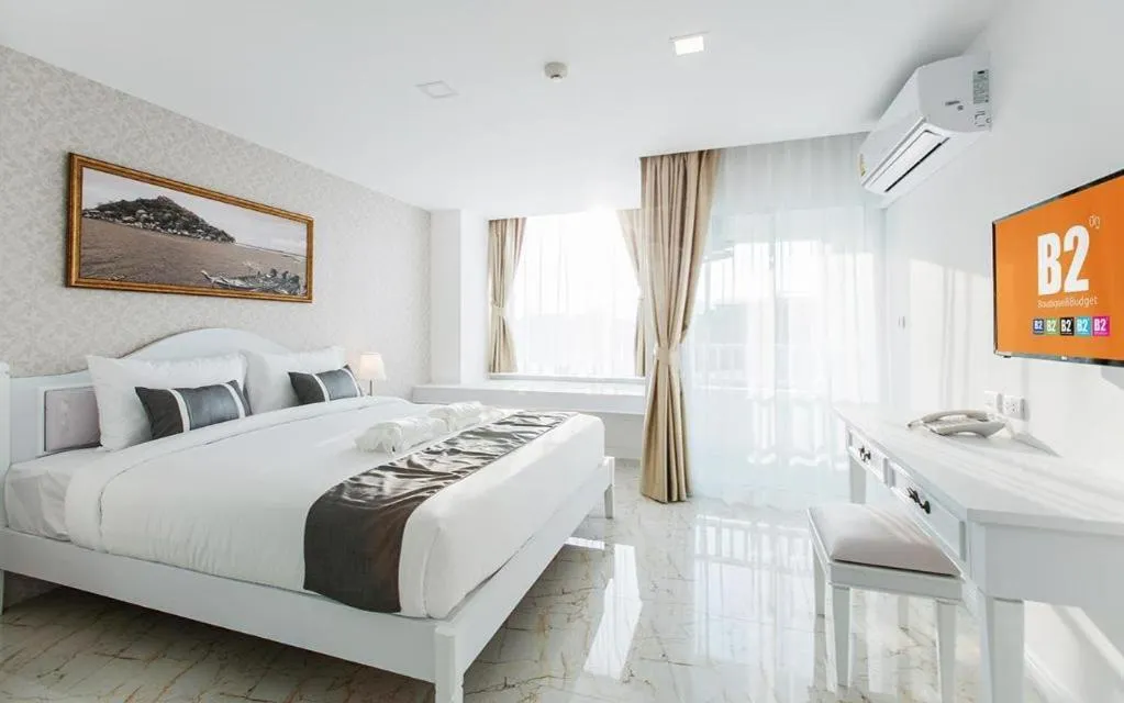 Bed in B2 Hua Hin Premier Hotel