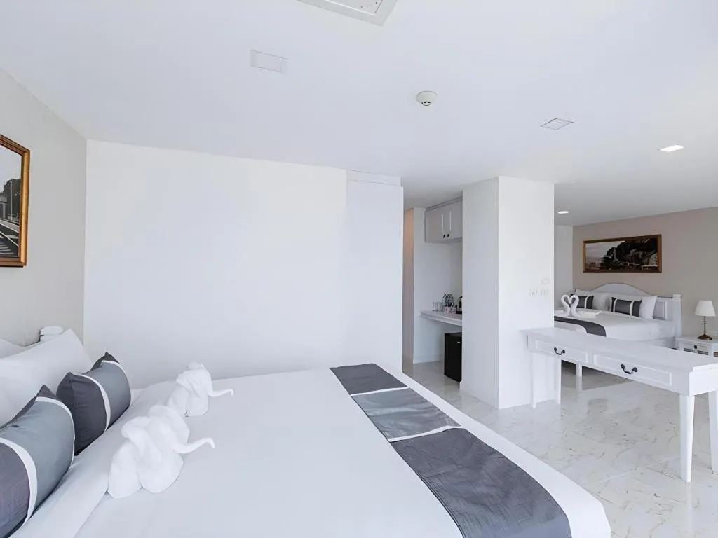 Bed in B2 Hua Hin Premier Hotel