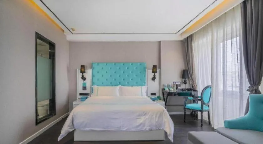 Bed in Xana Hotelle Beijing Qianmen Footbridge Metro Station