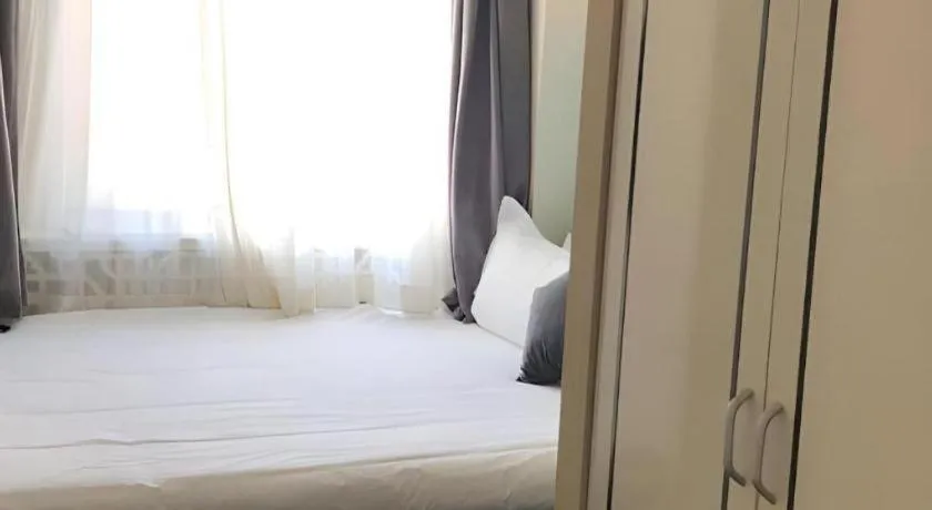 Bed in Xana Hotelle Beijing Qianmen Footbridge Metro Station