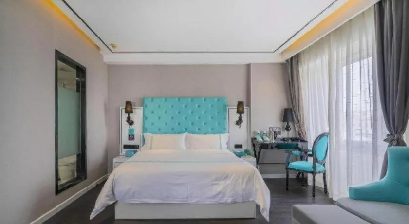 Bed in Xana Hotelle Beijing Qianmen Footbridge Metro Station