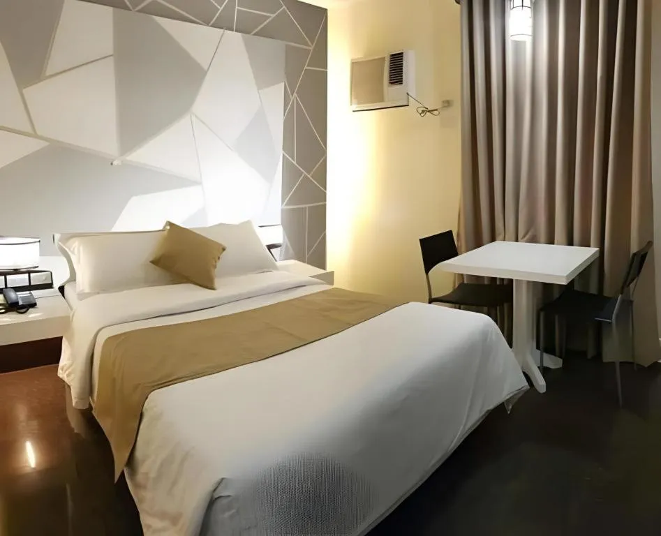 Bed in Vista Hotel Cubao