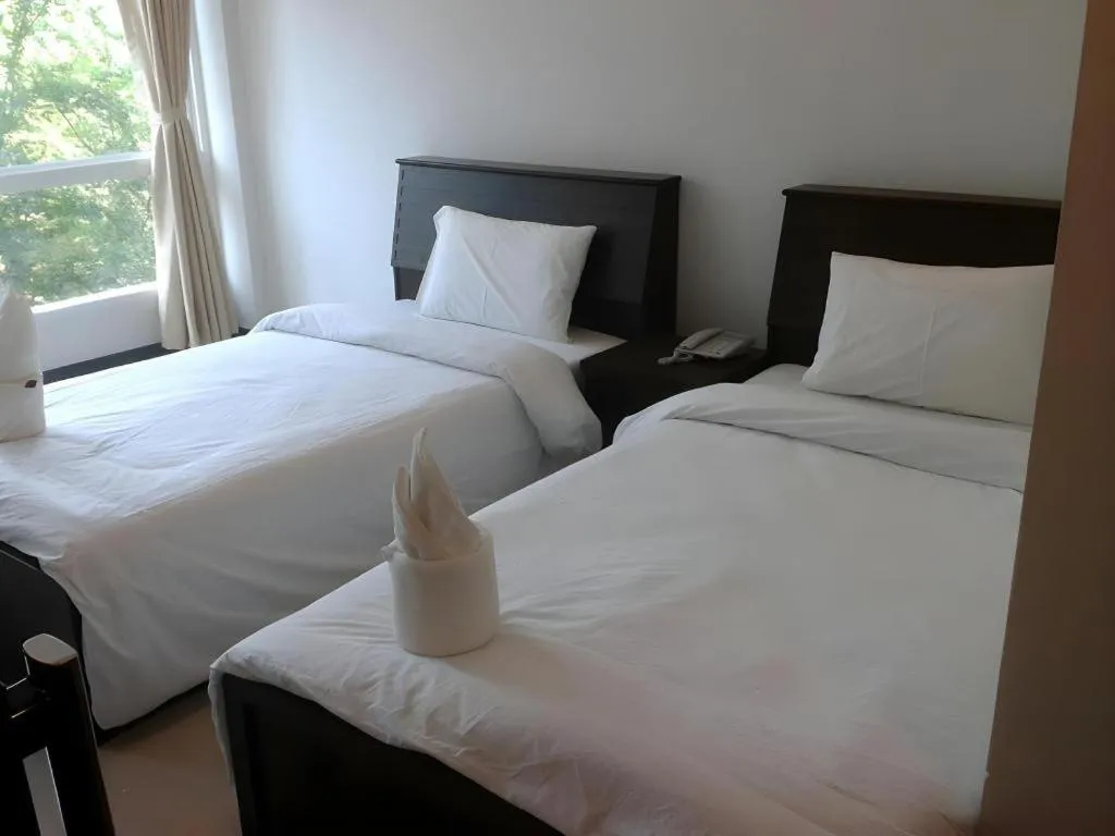 Bed in Baan Payai Resort