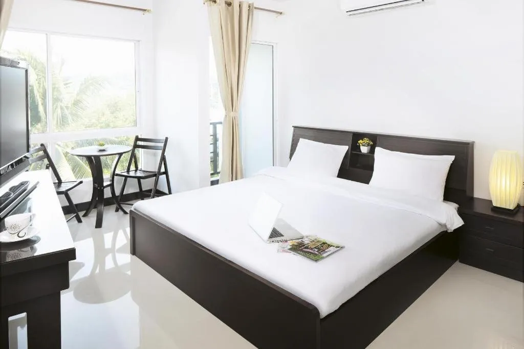 Bed in Baan Payai Resort