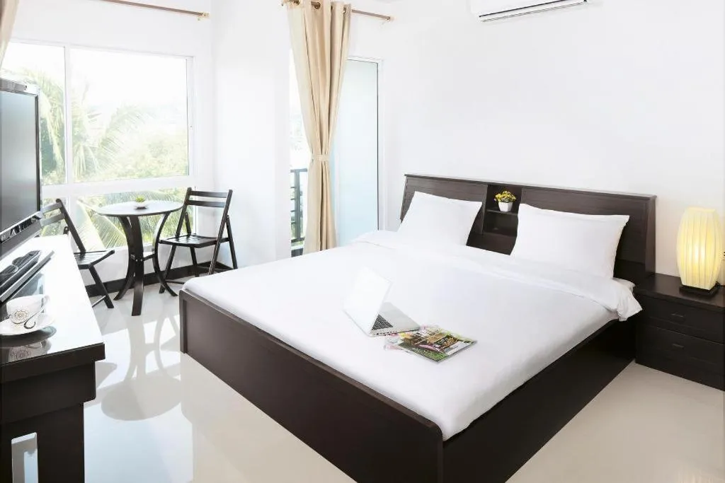 Bed in Baan Payai Resort