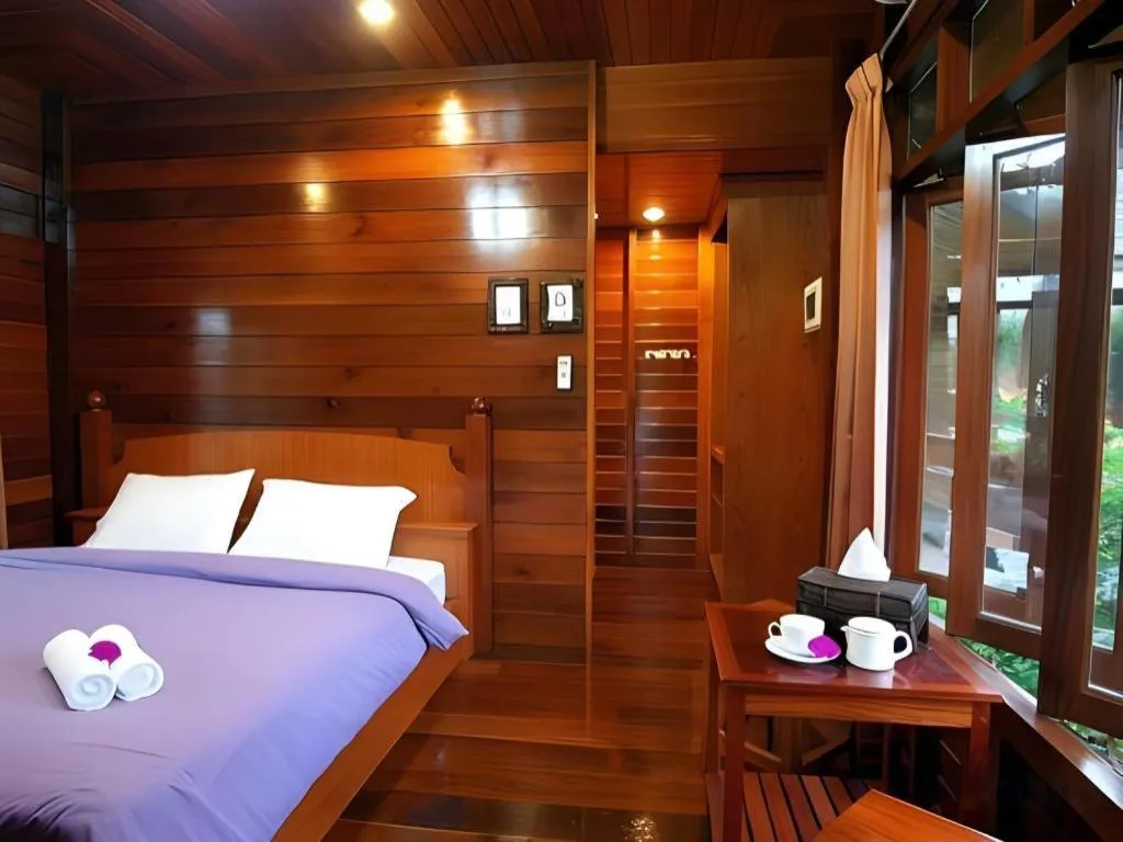 Bed in Baansuan Amphawan Resort