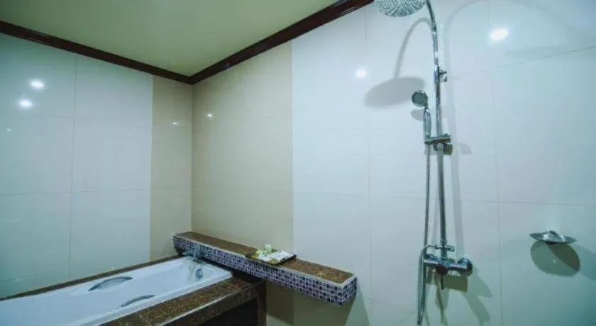 Bed in AmornSukhothai Hotel