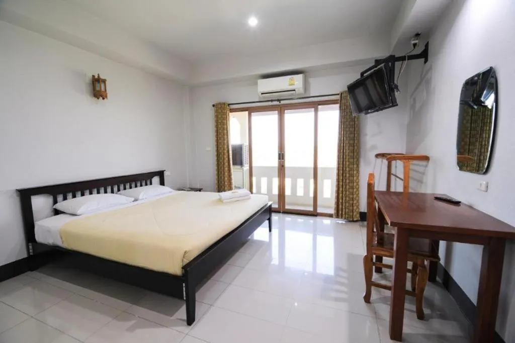 Bed in AmornSukhothai Hotel