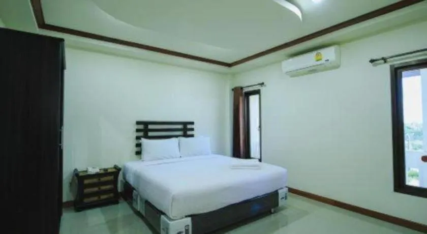 Bed in AmornSukhothai Hotel