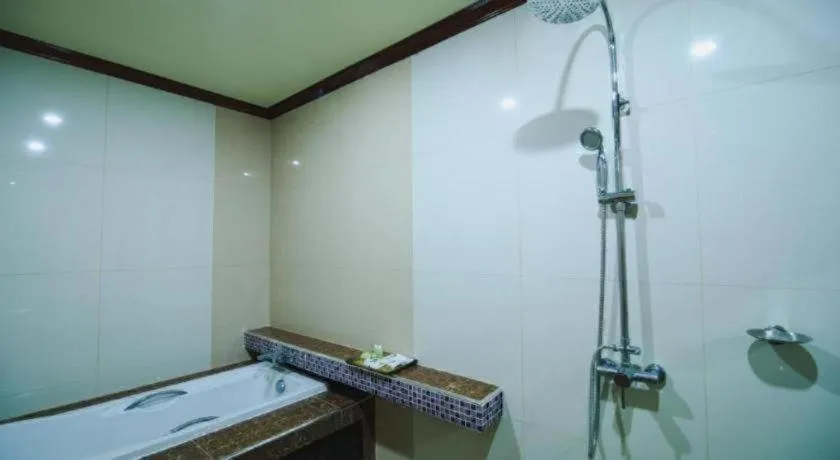 Bed in AmornSukhothai Hotel