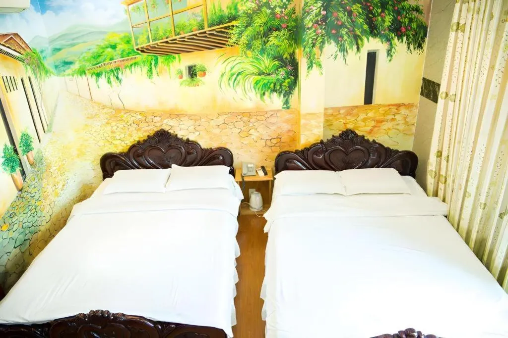 Bed in Phuong Linh Hotel