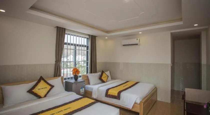 Bed in sun lake hotel