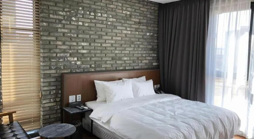 Bed in Hotel Morning Calm