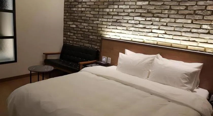 Bed in Hotel Morning Calm