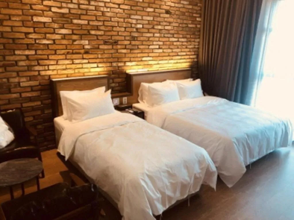 Bed in Hotel Morning Calm