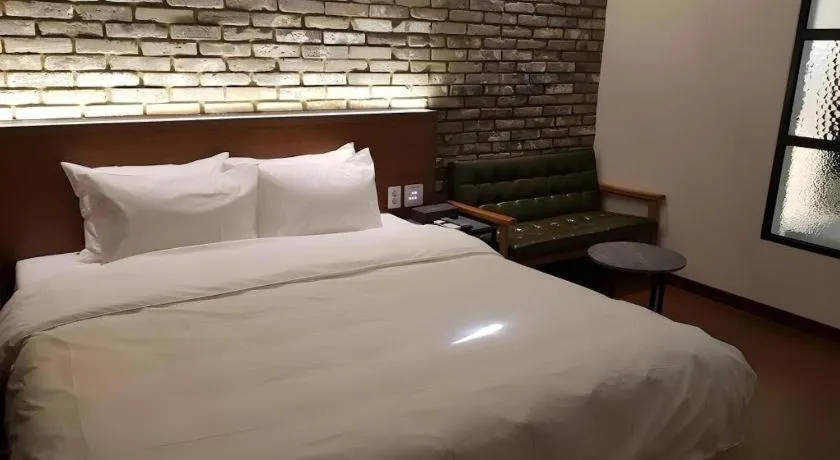 Bed in Hotel Morning Calm