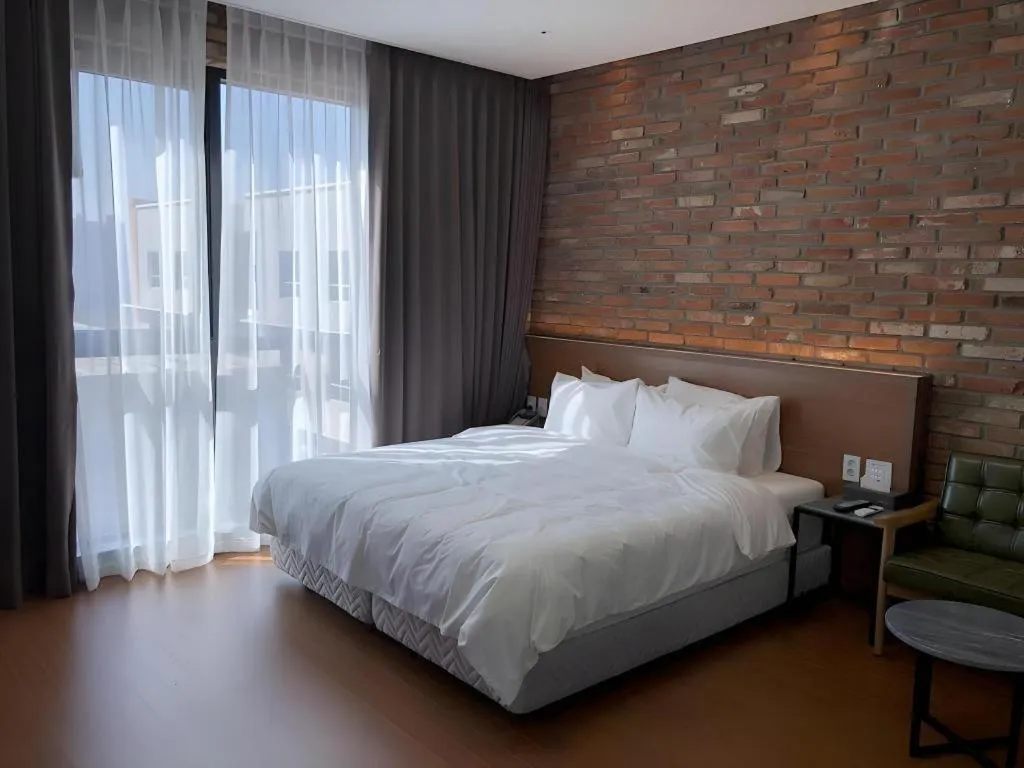 Bed in Hotel Morning Calm