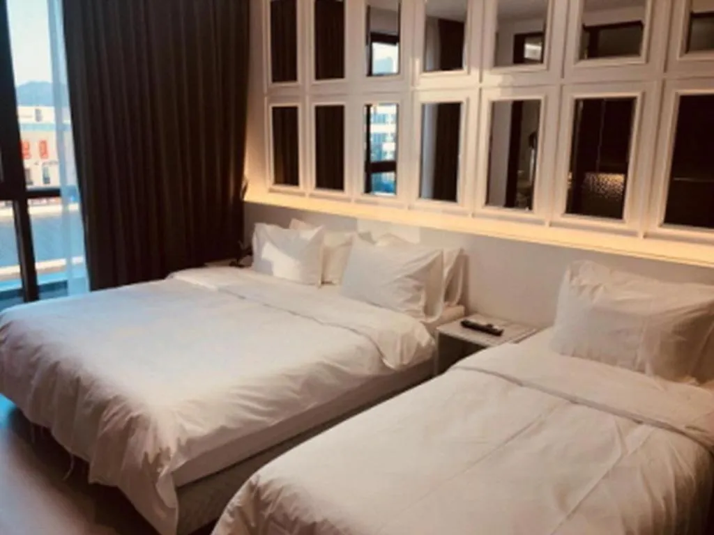 Bed in Hotel Morning Calm