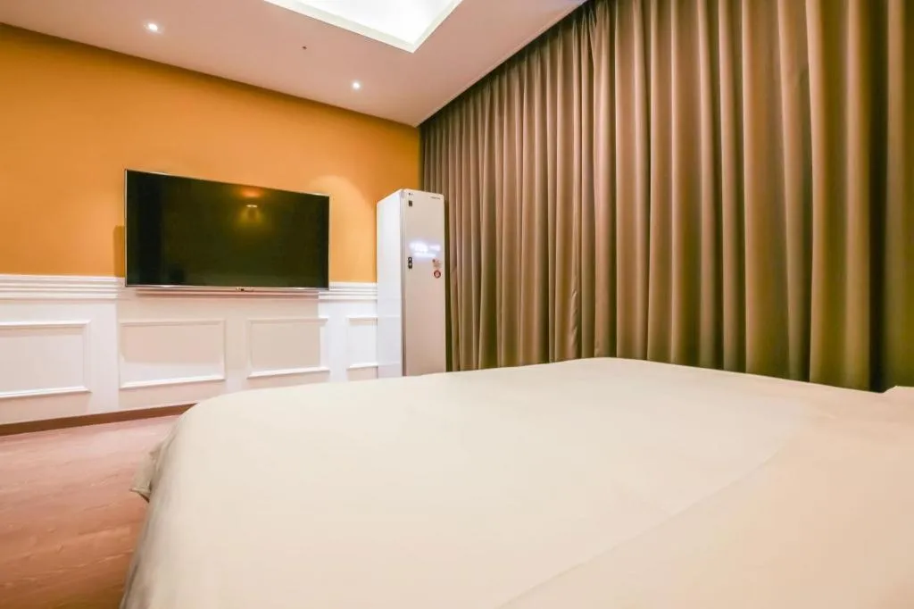 Bed in Hotel Morning Calm