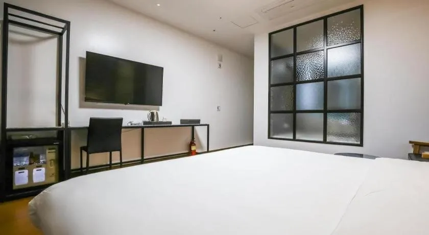 Bed in Hotel Morning Calm