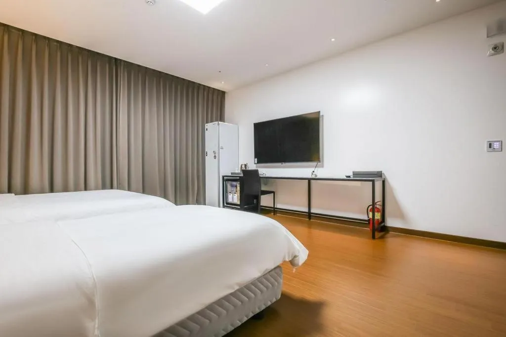 Bed in Hotel Morning Calm