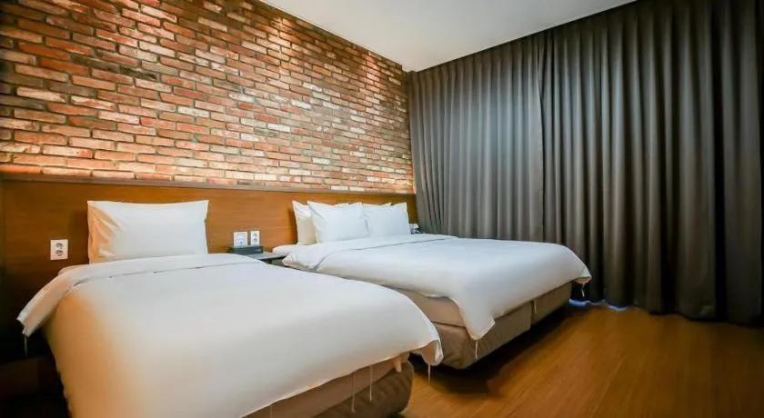 Bed in Hotel Morning Calm