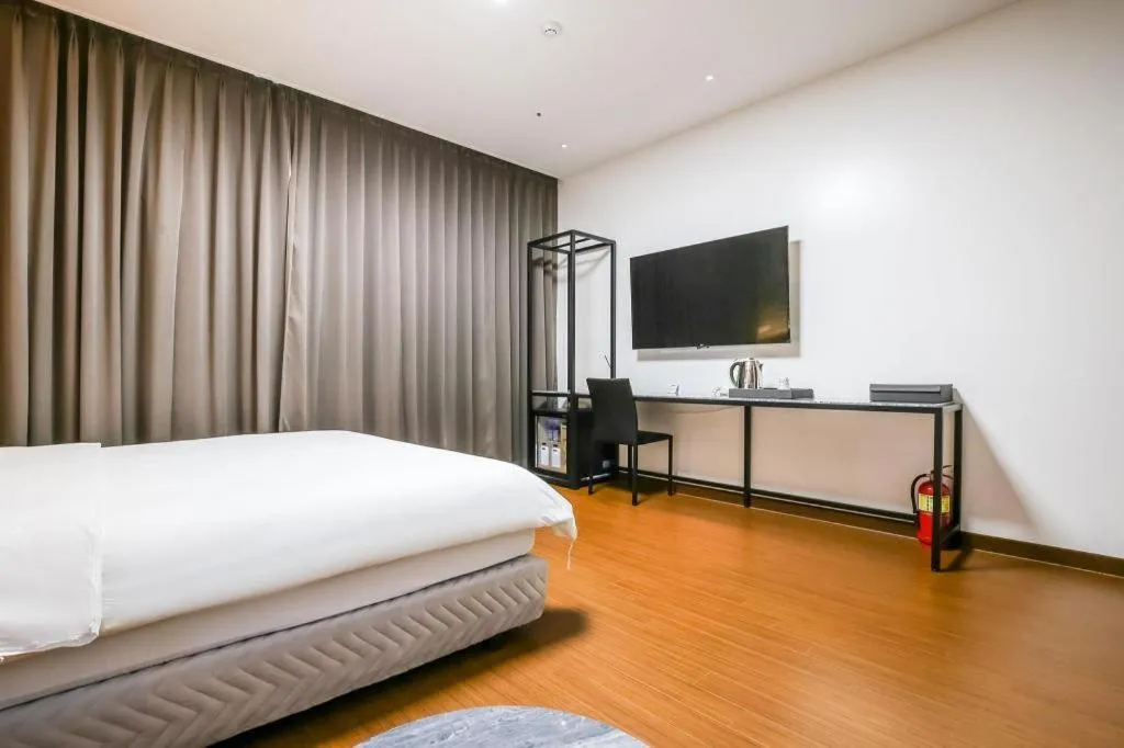 Bed in Hotel Morning Calm