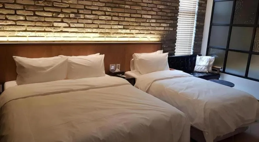 Bed in Hotel Morning Calm