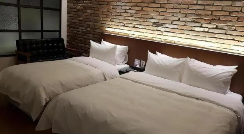 Bed in Hotel Morning Calm