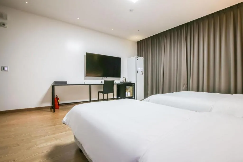 Bed in Hotel Morning Calm